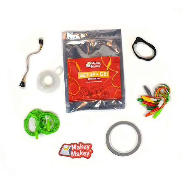 Get Up + Go Booster Kit Supplies on white background. Jumper wires, long alligator clips, long wire, Makey Makey sticker, Conductve fabric tape, extra alligator clips, and anti static bracelet